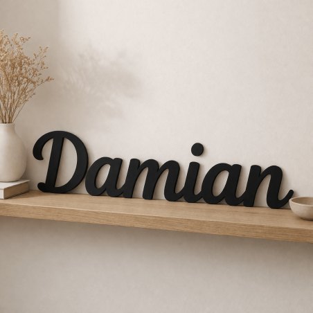 Houten tekst op maat in MDF zwart als decoratie op wandplank