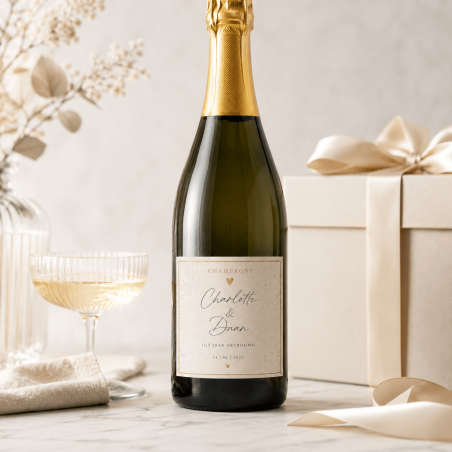Gepersonaliseerd champagne etiket als cadeau op champagnefles